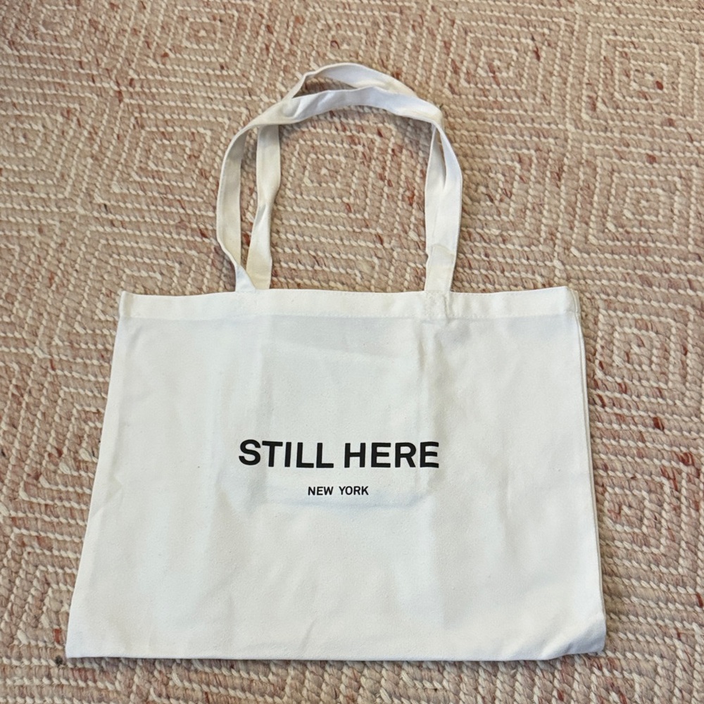STILL HERE White Tote Bag